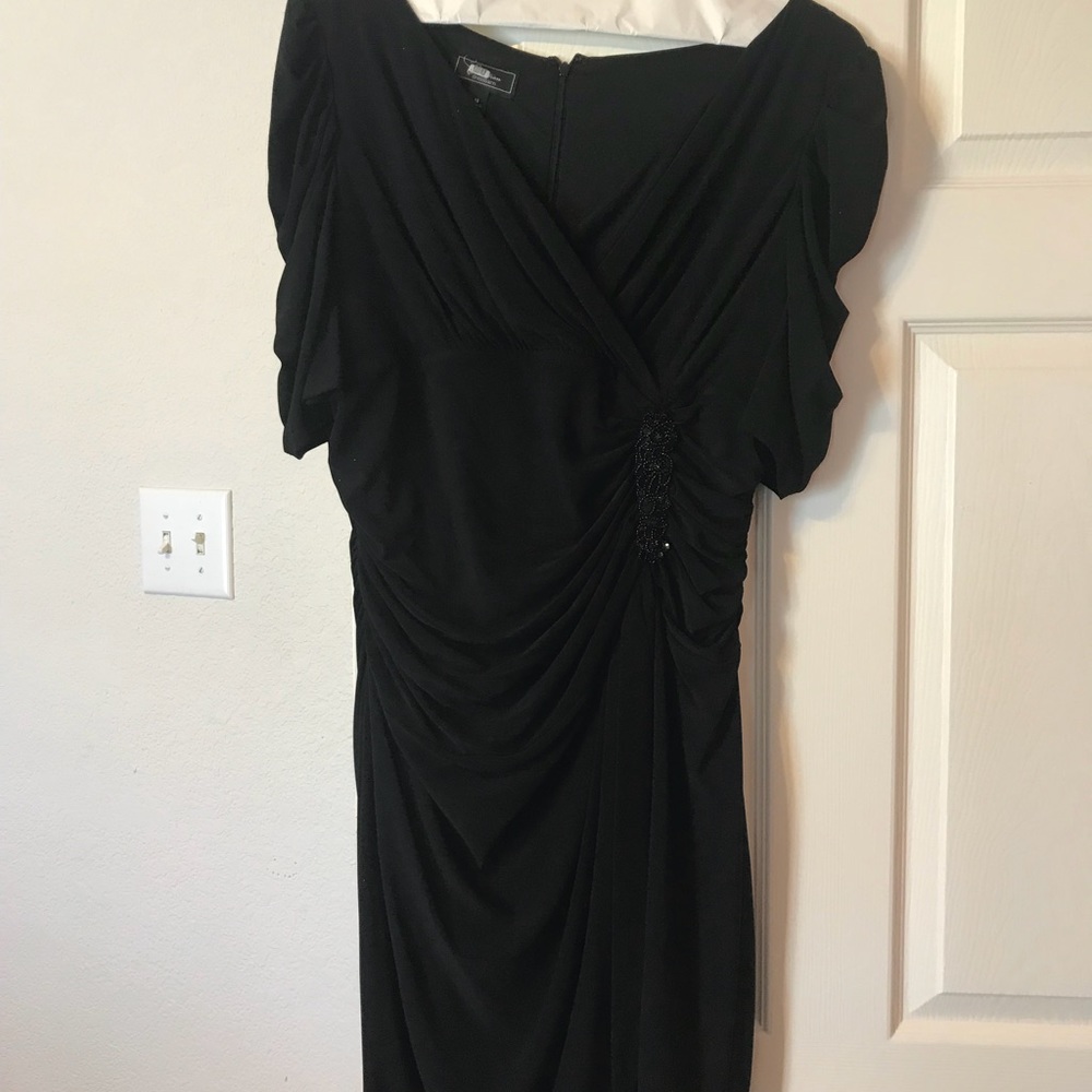 Black dress with beaded detail.